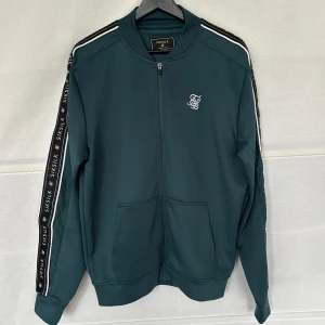 Siksilk - Oanvänd, storlek M