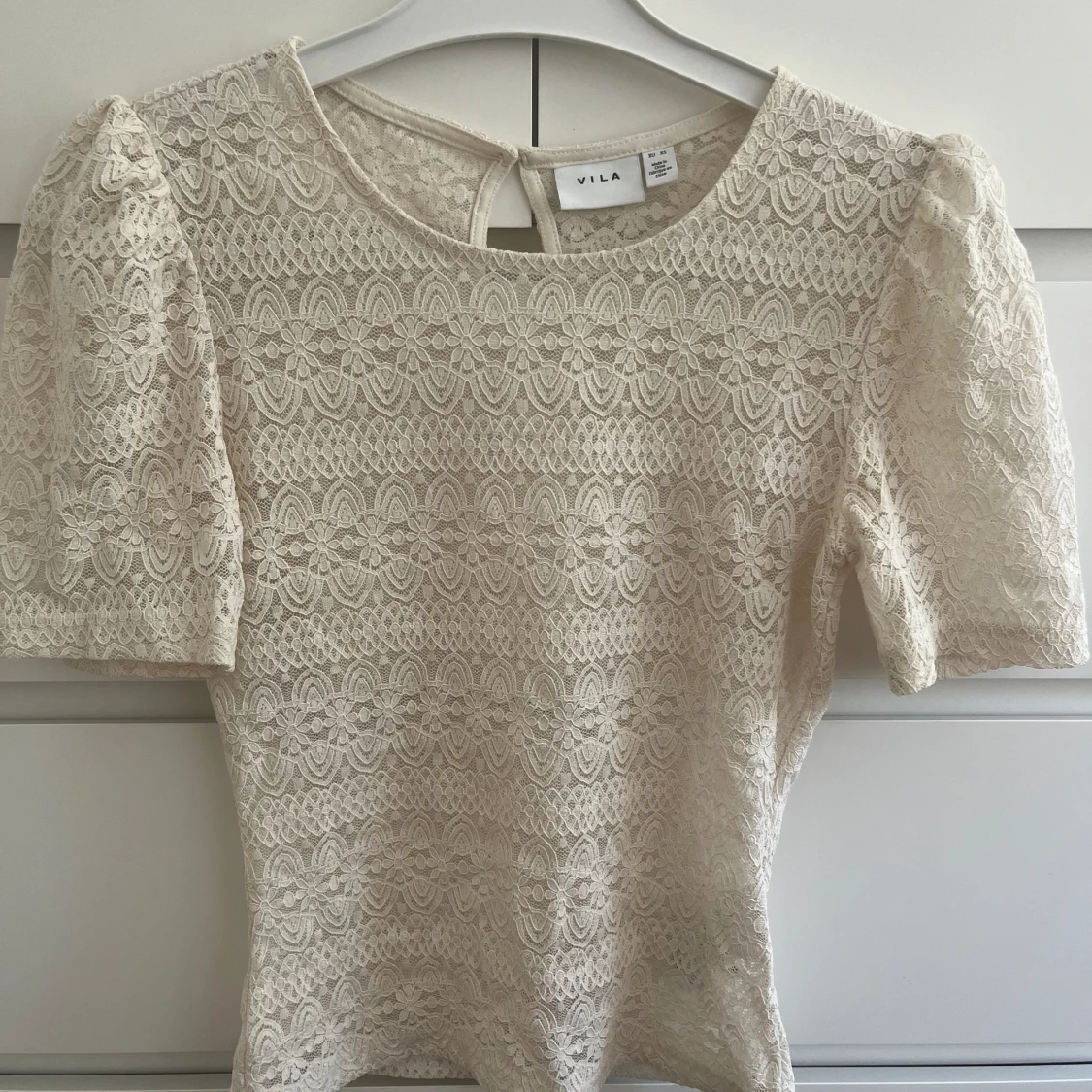 Kortärmad spetstopp 