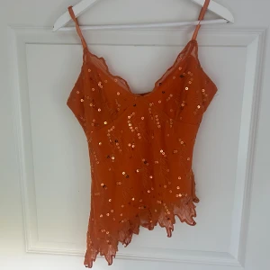 Orange sommartopp - Perfekt inför sommaren 