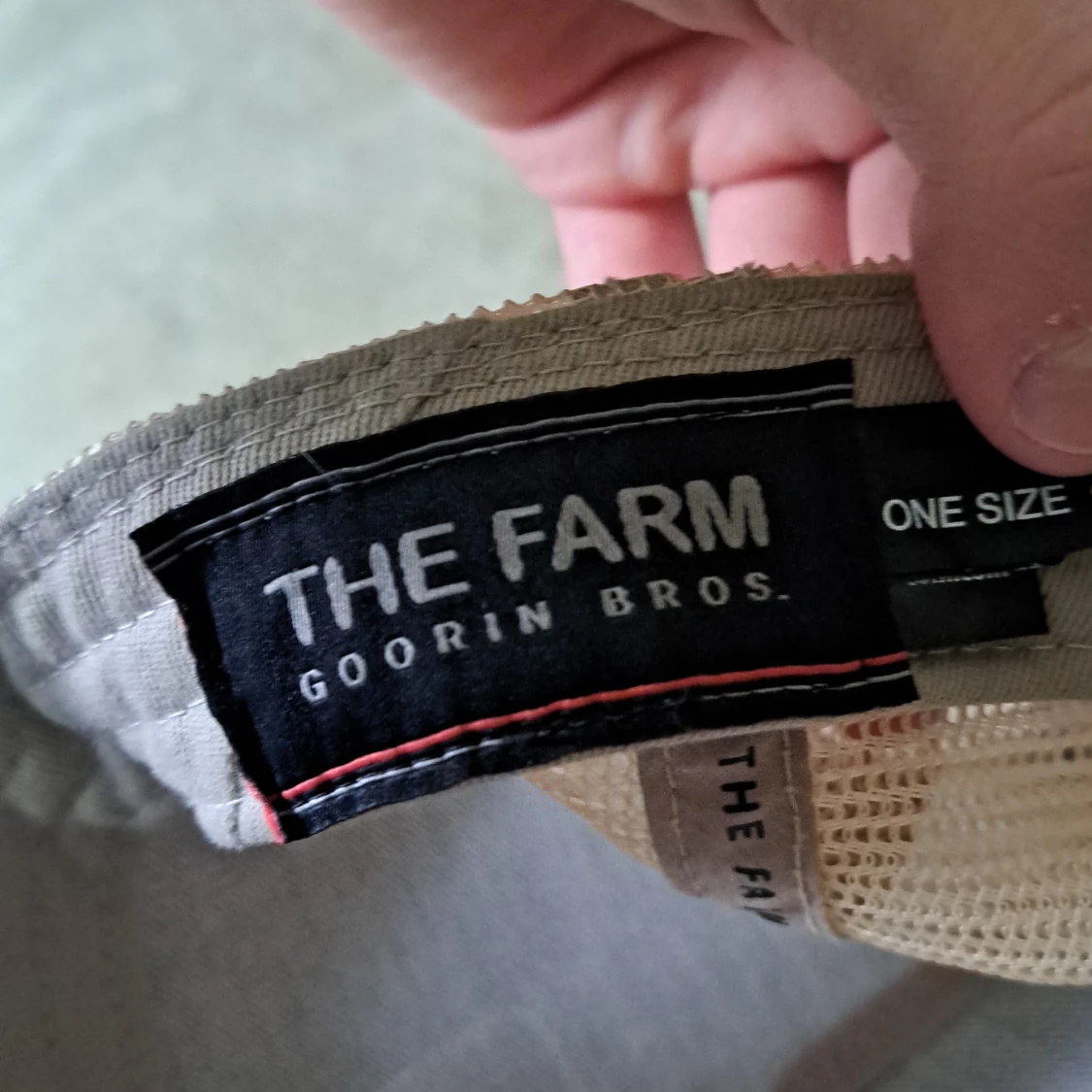 En "The farm" keps, lejon - 92