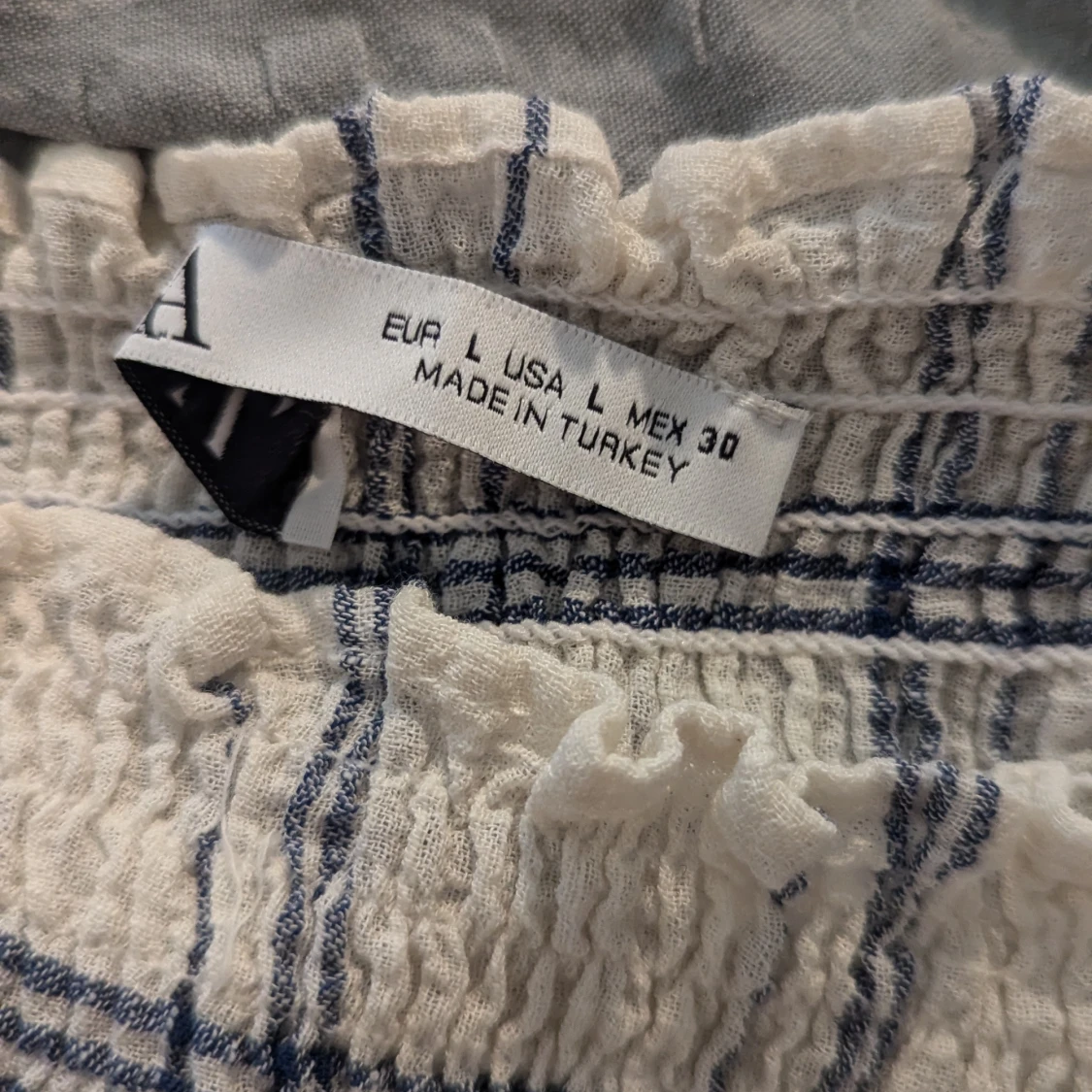 Rutig blus med långa ärmar - 91