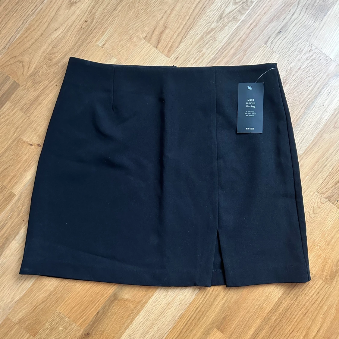 Svart minikjol NA-KD, strl 42