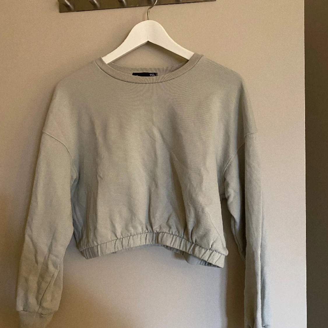 Kroppad sweatshirt 