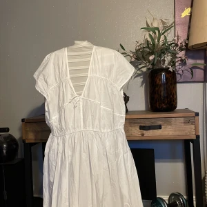 Lång klänning  - Fin lång klänning, aldrig använd. 