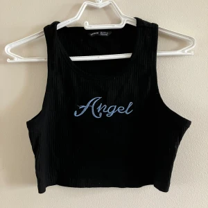 Svart topp ”angel” - Fin topp med stretchig passform