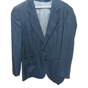 Kavaj (L) rutig - I fint skick. Storlek L. Made in Sweden. Material: Ull.