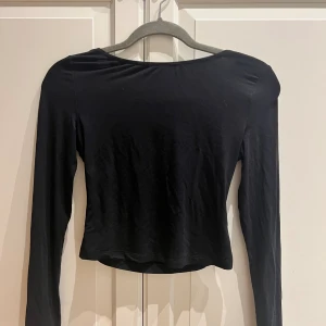 Långärmad öppen rygg topp - Fint skick!