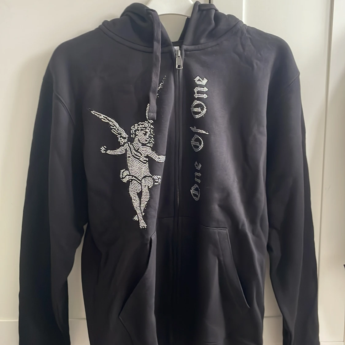 One of one zip hoodie