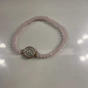 Armband  - Armband med rosa stenar 