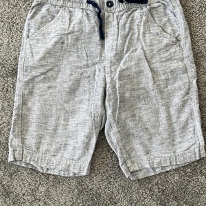 Linneshorts - Ljusblå melerade linneshorts