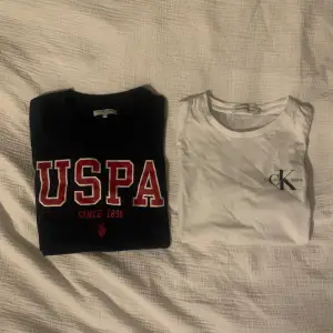 2 T-shirts, en från USPA och en från Calvin Klein. (12-13 år)