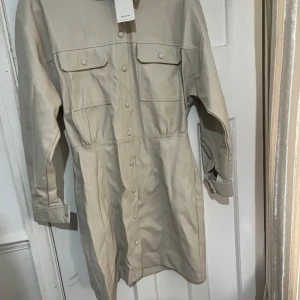 Leather dress/jacket  - Leather, large with stretch so fits 12-16