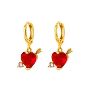 Material: Stainless Steel. Measurements: 13-20 mm. Cupid Love Earrings – These enchanting, gold-plated, stainless steel earrings showcase a pair of delicately crafted cupid wings, providing a lightweight and comfortable adornment for any occasion. 