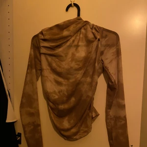 Fest topp - En topp som jag ej använt då jag inte tyckt jag passar i den.