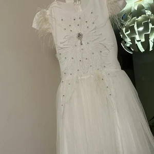 Klänning  - En klänning som har använt en gång 