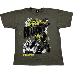 T-Shirt med Tryck - Grön T-Shirt. Bra skick! Ställ gärna frågor