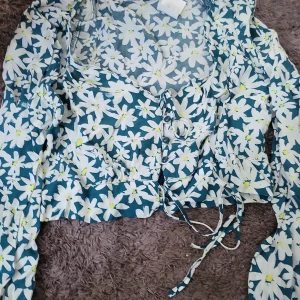 Långarmad - En blommig långarmad har aldrig på mig den