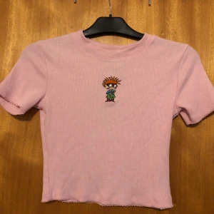 Babytee rugrats - Nyskick aldrig använd  Mjuk Stretch  Xs-m
