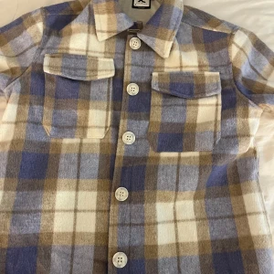 Kappa för barn - En kappa för barn som är väldigt söt och varm. Använd få gånger 