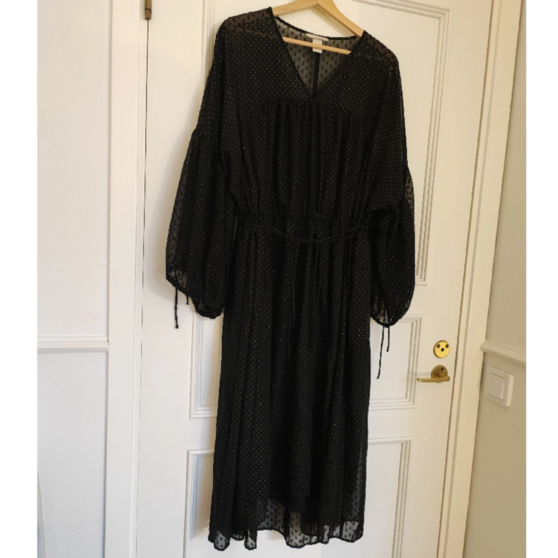 Glittrig klänning stl M - 90