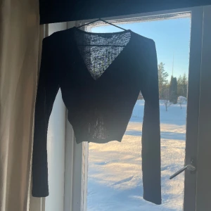 långärmad knyt topp - Svart långärmad knyt topp från new yorker