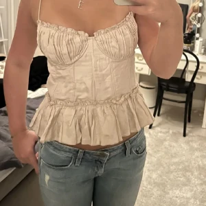 Hm topp  - Söt hm topp som är knappast använd (lånad bild)