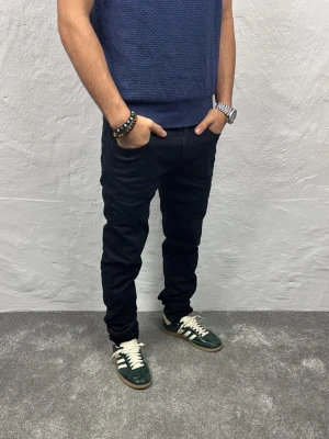 Replay jeans  - Ett par riktigt snygga jeans från Replay i storlek W30 L32 i modellen anbbas hyperflex 