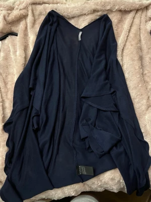 Poncho  - Fint skick