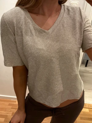 Glittrig topp - Superfin 