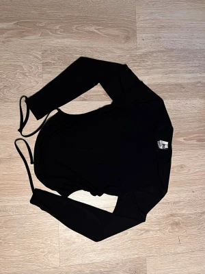 Backless topp - Backless topp från Nelly.com i storlek S 🍋