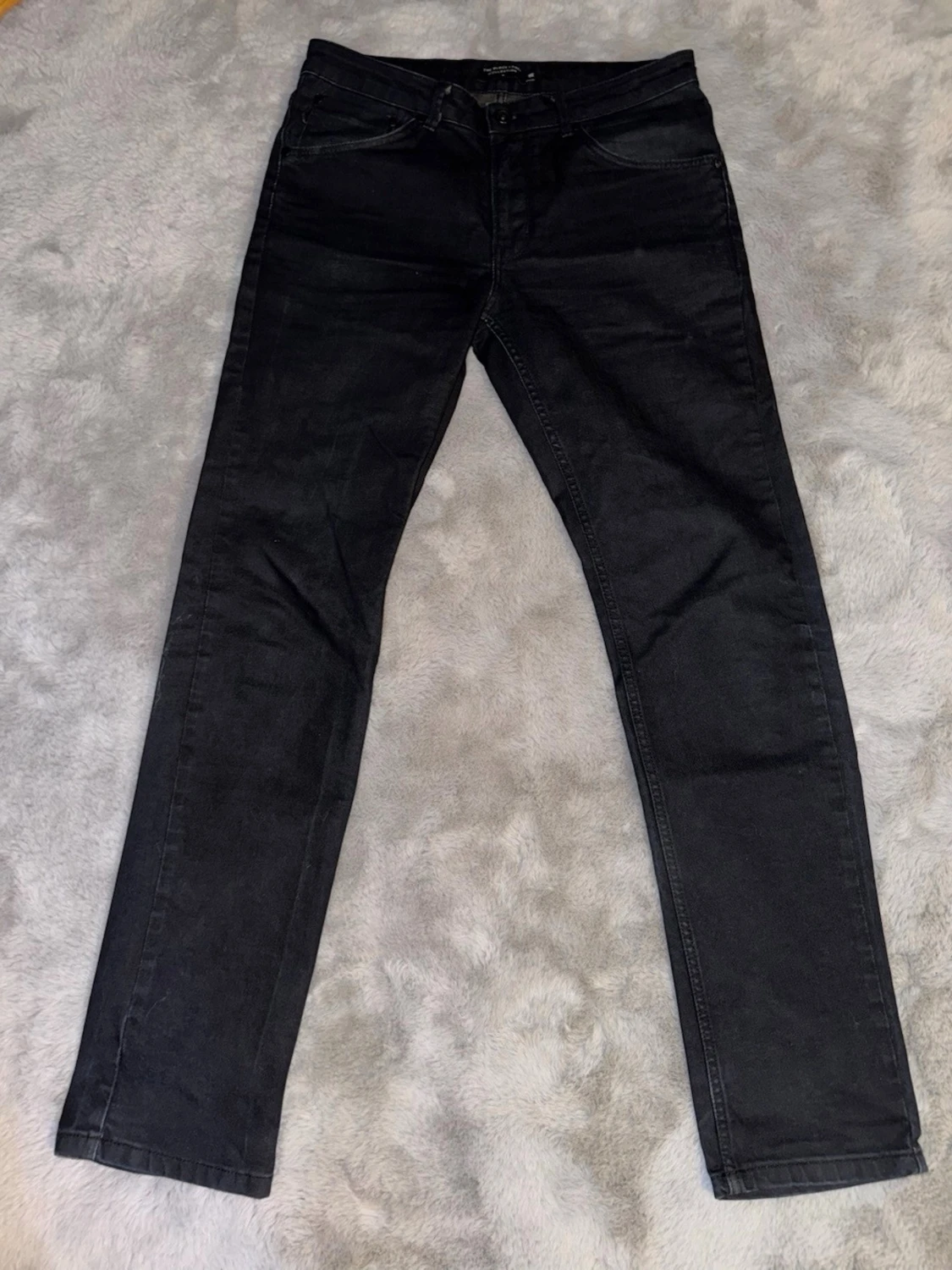 Svarta slim fit jeans
