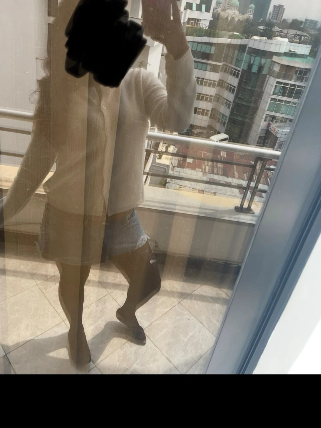 Vit kofta med knappar 