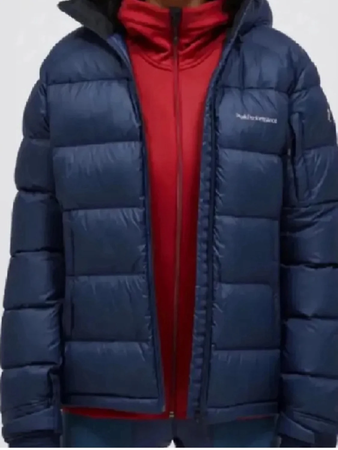 Blå dunjacka från Peak Performance
