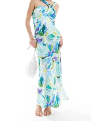 Maxidress från Asos design  - Snygg långklänning med blommigt mönster i blått, grönt och lila. Klänningen har en unik oneshoulder-design med twistad axelband och är tillverkad i satinliknande material. Aldrig använd så i nyskick. Storlek 34/XS. Nypris är 900 kr! 