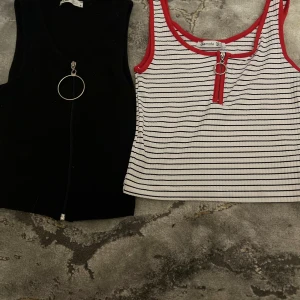 Toppar  - Svarta toppen: SÅLD. Säljer endast randiga toppen för 30 kr 