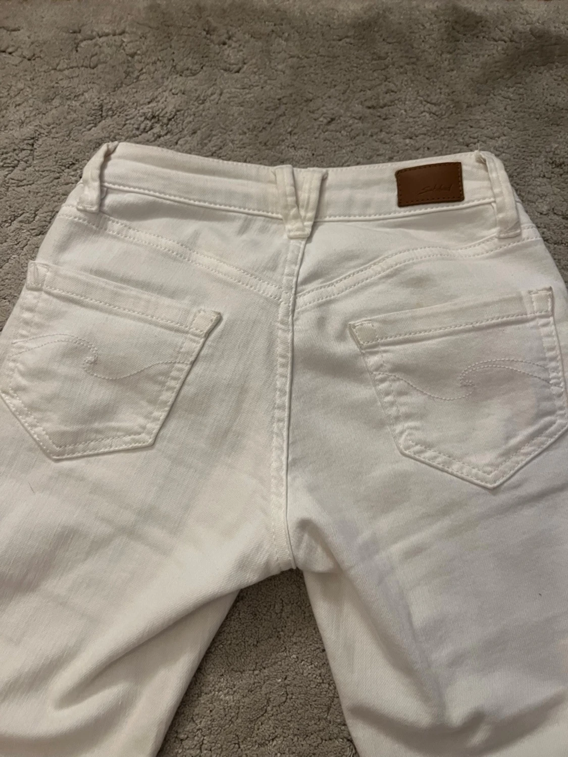 Vita bootcut jeans från Subdued - 2