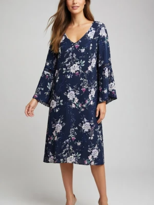 Blommig marinblå klänning med v-ringning, storlek 40 - Ny snygg marinblå klänning med v-ringning och blommigt mönster. Klänningen har långa, utsvängda ärmar och slutar strax under knät. Perfekt för dig som gillar en avslappnad men ändå chic stil.                                                       Längd: ca 91 cm Bredd: ca 100 cm     Armlängds: ca 48 cm                                                        Material: viskos, storlek 40                           