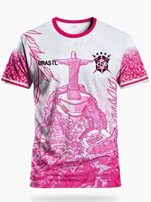 Vit och rosa t-shirt med Brasilienmotiv - Unik t-shirt i vitt och rosa med tryck av Kristusstatyn i Rio och grafiska detaljer. Rund halsringning med rosa kant och matchande ärmslut. Perfekt för dig som gillar färgstarka plagg och streetwear vibes.