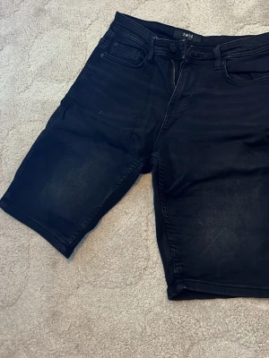 Jeanshorts från smog - Svarta. Xs. Nyskick, aldrig använda. 