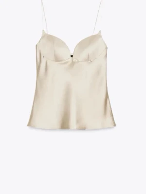 Champagnefärgad sidenlinnetopp - Supersnygg linnetopp i champagnefärgat siden med tunna axelband och lätt formade kupor. Aldrig använd💓