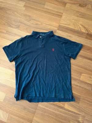 Ralph lauren pike  - Inte helt perfekt i färgen då den inte är ny 