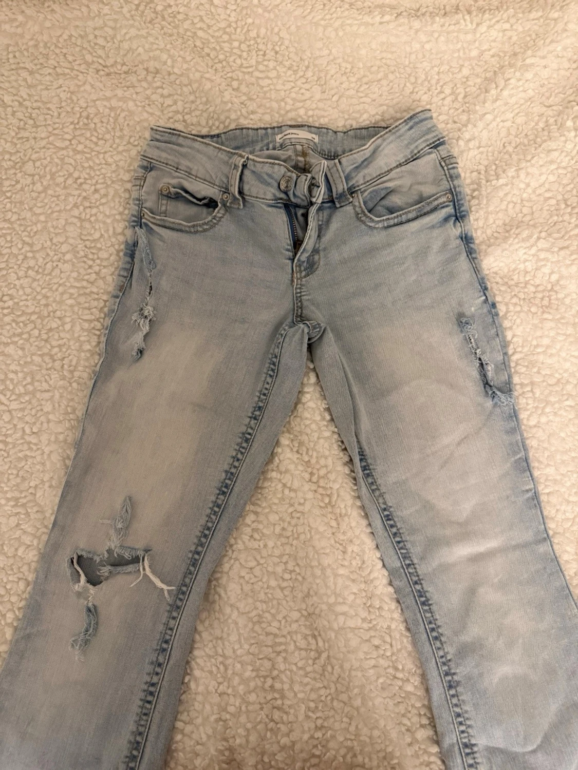 Ljusblå ripped jeans från Perfect Jeans