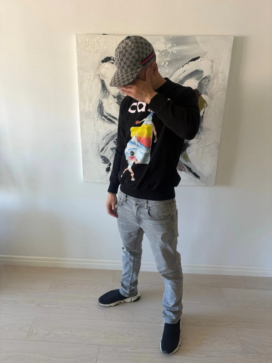 Svart långärmad topp med tryck från Casa