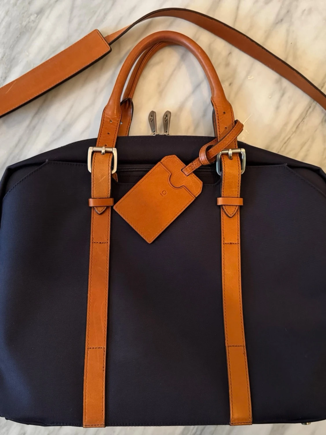 Portfölj från Stuart & Lau med läderdetaljer