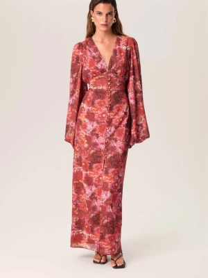 Adoore blommig långklänning - ny med lappar kvar - Adoore långklänning i rödrosa blommigt mönster med v-ringning och knappar framtill. Klänningen har långa puffiga ärmar och markerad midja.  Storlek 32. Helt ny och aldrig använd – alla lappar sitter kvar. Säljs eftersom den tyvärr är för liten.  Nypris: 1695 kr