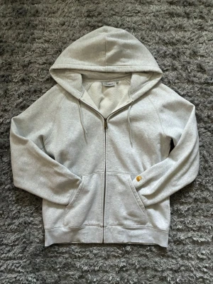 Carhartt hoodie - Carhartt grey zip-up hoodie, men’s size M. Excellent condition with no signs of wear. Made from high-quality, soft, and durable material — perfect for everyday wear. Classic fit and versatile style. 🔥