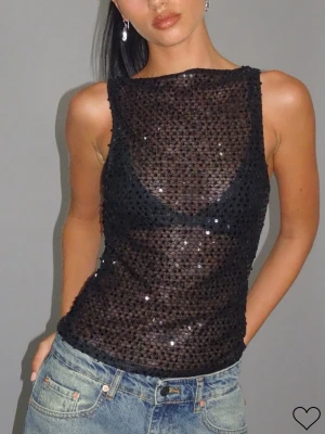 Topp - Topp från Motel rocks i storlek xs, aldrig använd med prislapp kvar, säljs då den va för liten! 