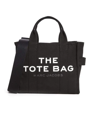 Marc Jacobs Tote Bag Mini - Super snygg tote bag mini i svart. Köpt på Jackie förra året, bra skick men lite missfärgad av solen. Bortsätt från det är den som ny. Skicka ett meddelande för fler bilder om det behövs. 