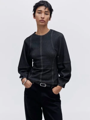 Topp med denimlook - Helt ny med prislapp från H&M. Aldrig använd. 