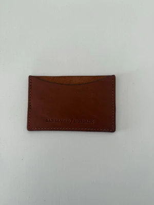 Sandlund/ Hossain korthållare - Sandlund/Hossain korthållare, helt ny aldrig använd💞